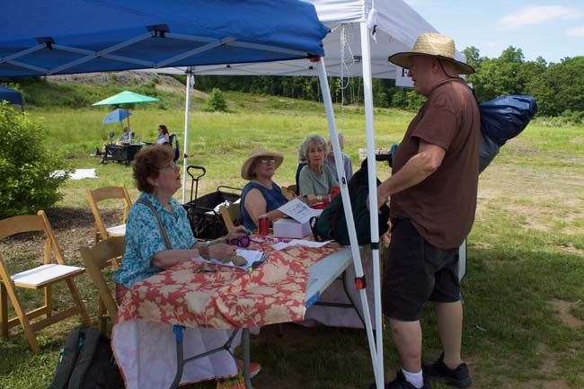 volunteers check in 24
