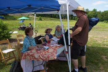 volunteers check in 24